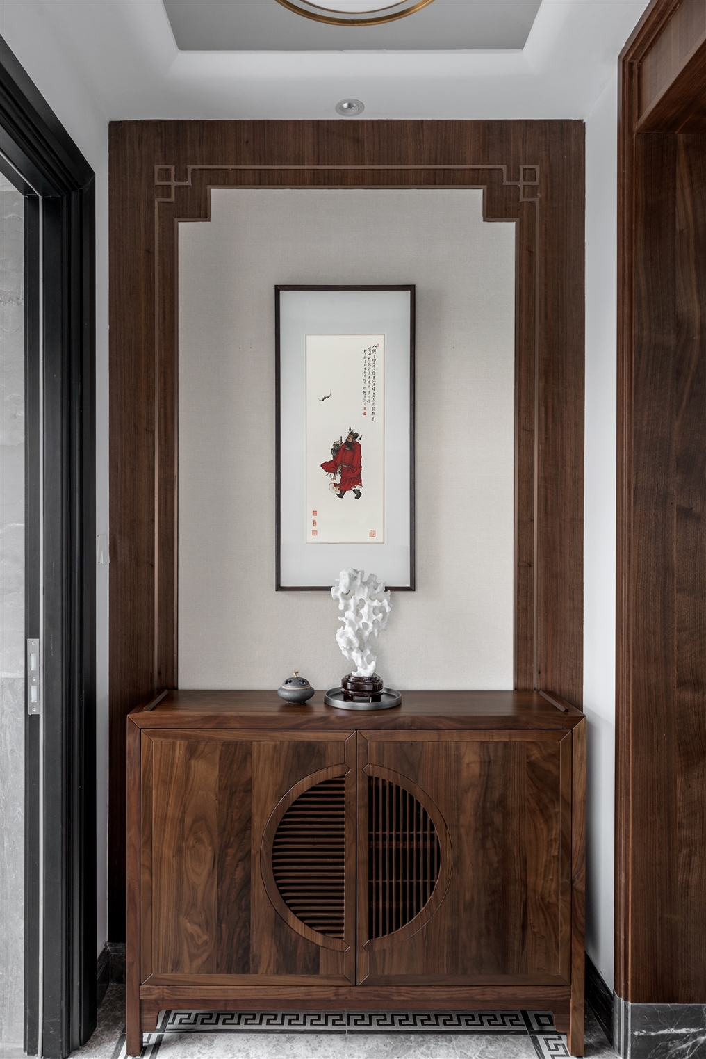 新中式風(fēng)格室內(nèi)家裝案例效果圖-玄關(guān) 新中式風(fēng)格室內(nèi)家裝案例效果圖-玄關(guān)